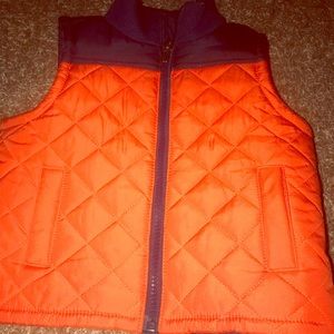 Blue and orange vest